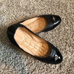 Coach flat shoes.
